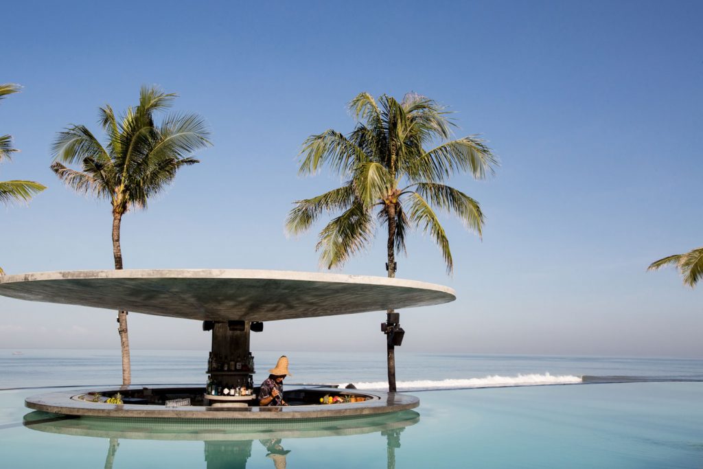 Pool And Pool Bar At Potato Head Seminyak With Ocean In Background